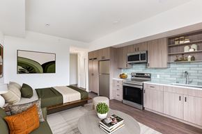 San Leandro apartment for rent - Staged photo of kitchen and living area