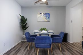 El Paso, Tx apartment for rent - A dining room with a table and blue chairs.