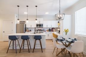 Broomfield apartment for rent - a kitchen and dining area with a table and chairs at Terracina, Broomfield, Colorado