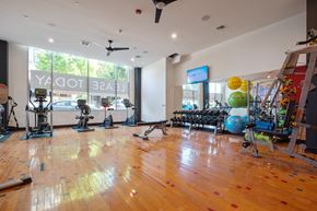 Berkeley apartment for rent - Apartments in Berkeley, CA, for Rent - The Addison - State-of-the-Art Fitness Facility with Stationary Bikes, Elliptical Machine, Free Weights, Bench Press, Exercise Balls, TV, Mirror Wall, and Ceiling Fans.