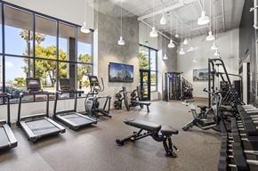 San Pedro apartment for rent - A gym with treadmills, exercise bikes, and other equipment.