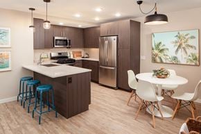 San Diego apartment for rent - Kitchen with stainless steel appliances and dining area at Driftwood, San Diego, 92109