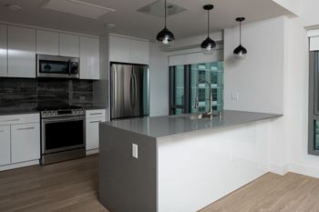 Premium stainless-steel appliance packages, including dishwashers and slide in gas ranges