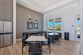 Roseville townhouse for rent - A dining room with a table and chairs.