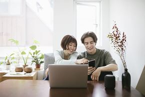 Upland apartment for rent - two people sitting at a table looking at a laptop