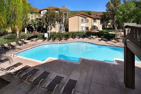 Playa Vista apartment for rent - a large swimming pool with chairs around it