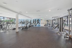 Los Angeles apartment for rent - A gym with treadmills, elliptical machines, and other cardio equipment at Wilshire Valencia Apartment, Los Angeles, California