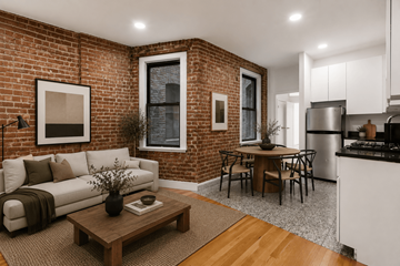 New York apartment for rent - A living room with a white couch and a coffee table in front of a brick wall.