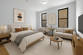 New York triplex for rent - A bedroom with a large bed and a couch.