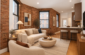 New York apartment for rent - A living room with a white couch and a coffee table.