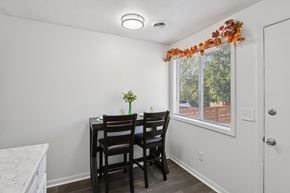 Indianapolis townhouse for rent - A small dining room with a table and chairs.