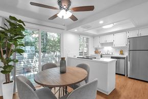 Columbus townhouse for rent - A modern kitchen with a dining table and chairs.
