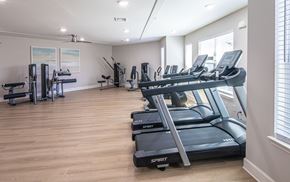 Wilmington apartment for rent - A gym with treadmills and other exercise equipment.