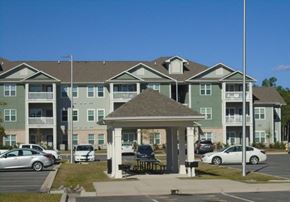 Southport apartment for rent - a gazebo in front of an apartment building