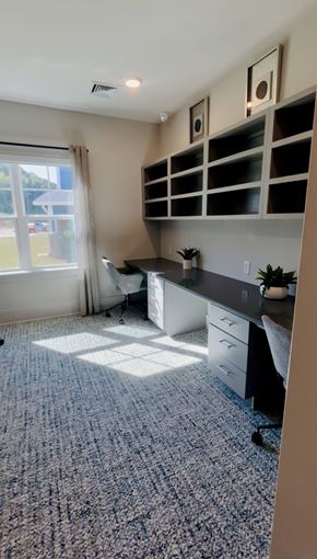 Raleigh apartment for rent - A room with a desk and a window.