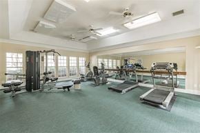 Greer apartment for rent - A spacious gym with treadmills, elliptical machines, and other exercise equipment.