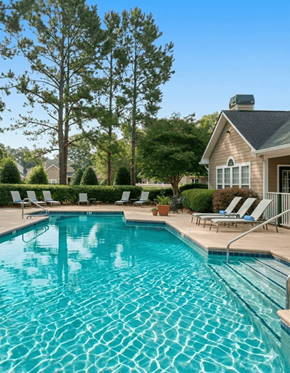 Greer apartment for rent - A swimming pool with a house and trees in the background.