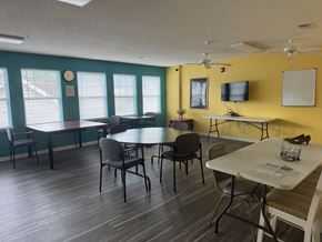 Jacksonville apartment for rent - A room with a table and chairs in it.