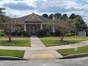 Aiken apartment for rent - the front of a house with a sidewalk and lawn
