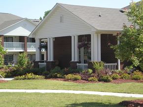 Toccoa apartment for rent - A house with a white porch and a grey roof.