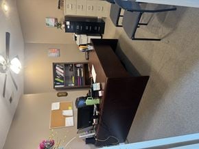 Jacksonville apartment for rent - A room with a desk, a chair, and a computer.