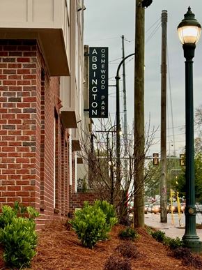 Atlanta apartment for rent - A brick building with a sign that says Abbington Park.