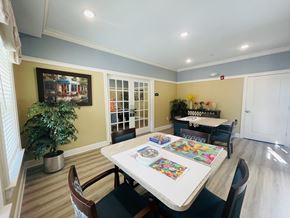 Buford apartment for rent - A dining room with a table surrounded by chairs.