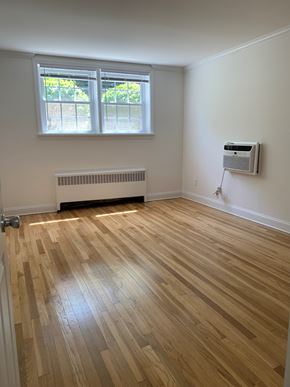 Caldwell apartment for rent - A room with a window and a radiator on the wall.