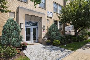 Millburn apartment for rent - The front of a building with a sign that says "FOCUS" on it.