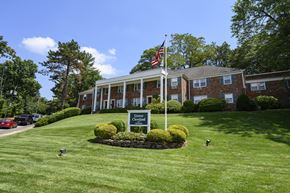Caldwell apartment for rent - A building with a sign that says "Governor" in front of it.
