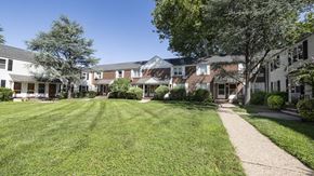 New Milford apartment for rent - A grassy area in front of apartment buildings.