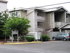 Seattle apartment for rent - a building with a car parked in front of it