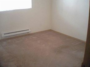 Seattle apartment for rent - an empty room with a heater on the floor