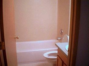 Seattle apartment for rent - a bathroom with a toilet and a bath tub
