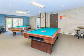 Spokane apartment for rent - a game room with two pool tables and two billiards at Lincoln Village Apartments, Spokane, WA