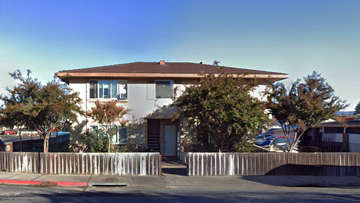Napa apartment for rent - A house with a brown roof and a white fence.