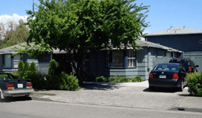 Novato apartment for rent - A car is parked in front of a house.