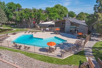 Sparkling swimming pool with sundeck