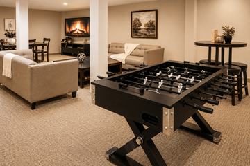 Overland Park townhouse for rent - A foosball table in the middle of a living room.