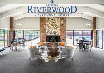 San Francisco townhouse for rent - a large living room with chairs and a fireplace
