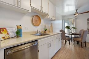 Alameda apartment for rent - Kitchen Sink, Dishwasher, and Dining Room at Three Crown Apartments, Alameda, CA, California, 94501