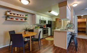 Hillsboro apartment for rent - a kitchen and dining room with a table and chairs