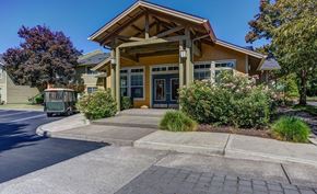 Hillsboro apartment for rent - a building with a trolley parked in front of it