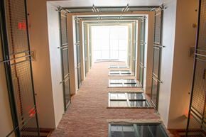 Lawrence apartment for rent - A long hallway with windows on the top floor.