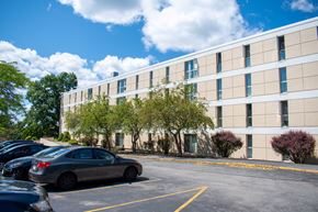 Marlborough apartment for rent - an office building with a parking lot in front of it