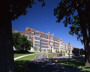 Mattapan apartment for rent - a picture of a large building with a blue sky in the background
