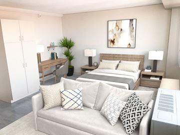 Boston apartment for rent - a living room with two beds and a couch