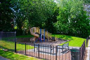 Dorchester townhouse for rent - a playground with a slide in a park
