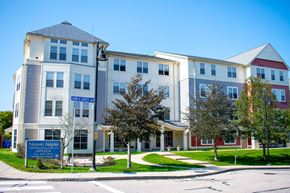 Newport apartment for rent - an image of an apartment building on the corner of a street