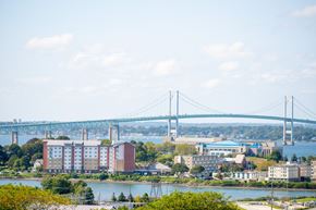 Newport apartment for rent - a view of the bridge over the water and a city with buildings and a river